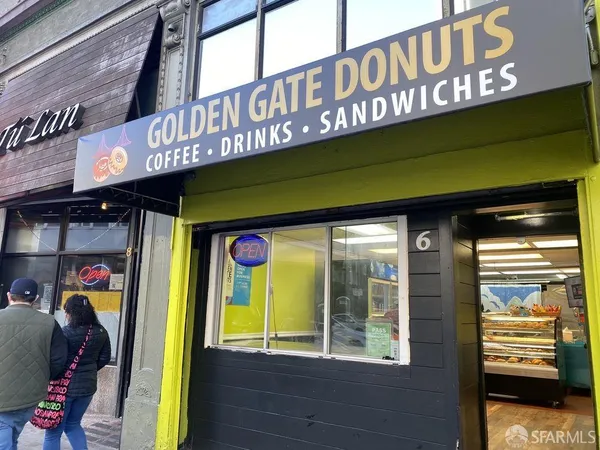 a view of a cafe with an outdoor seating