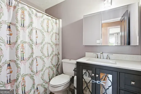 a bathroom with a sink and a toilet