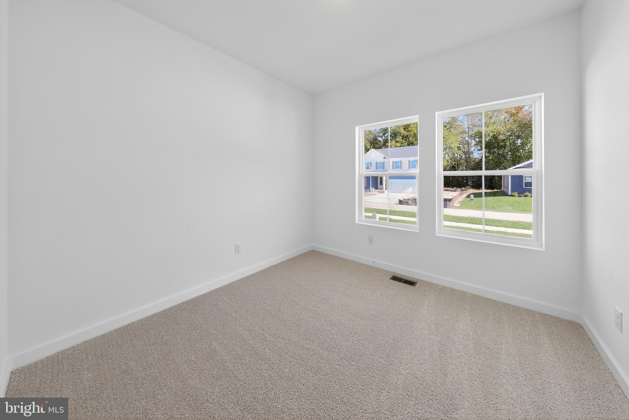 14966 Channel Run Ellendale, DE 19941 - Photo 18 of 21 an empty room with a window