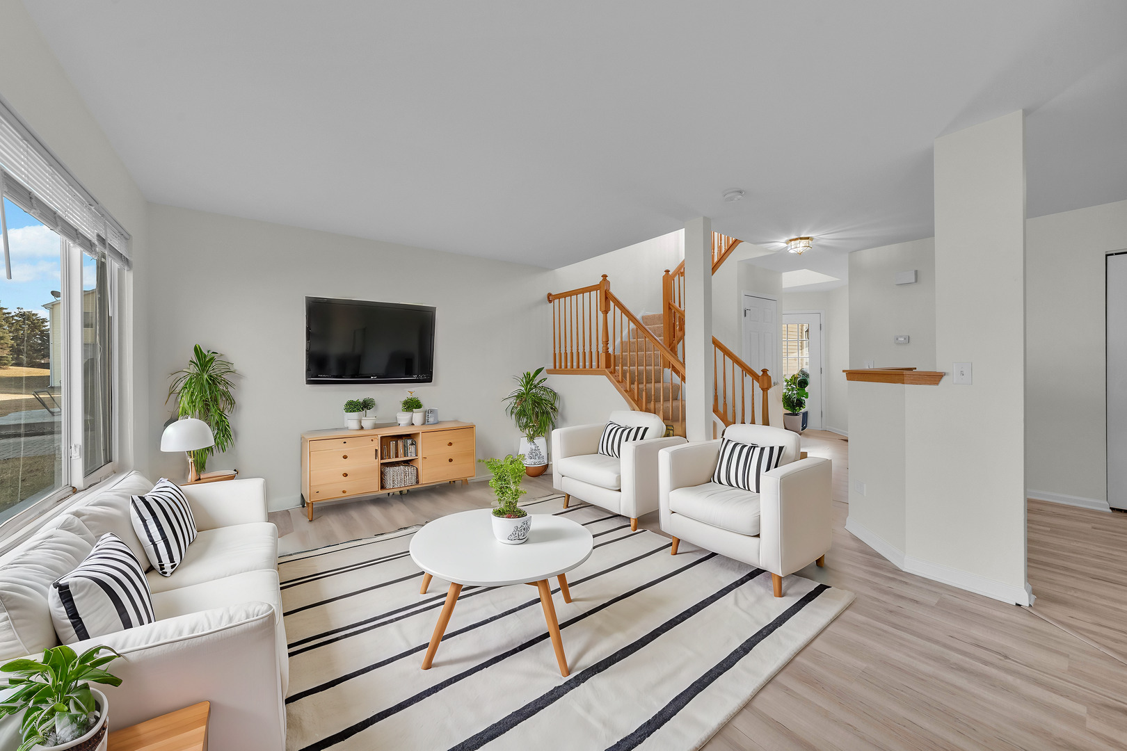 608 Chestnut Ridge Minooka, IL 60447 - Photo 7 of 16 a living room with furniture and a flat screen tv