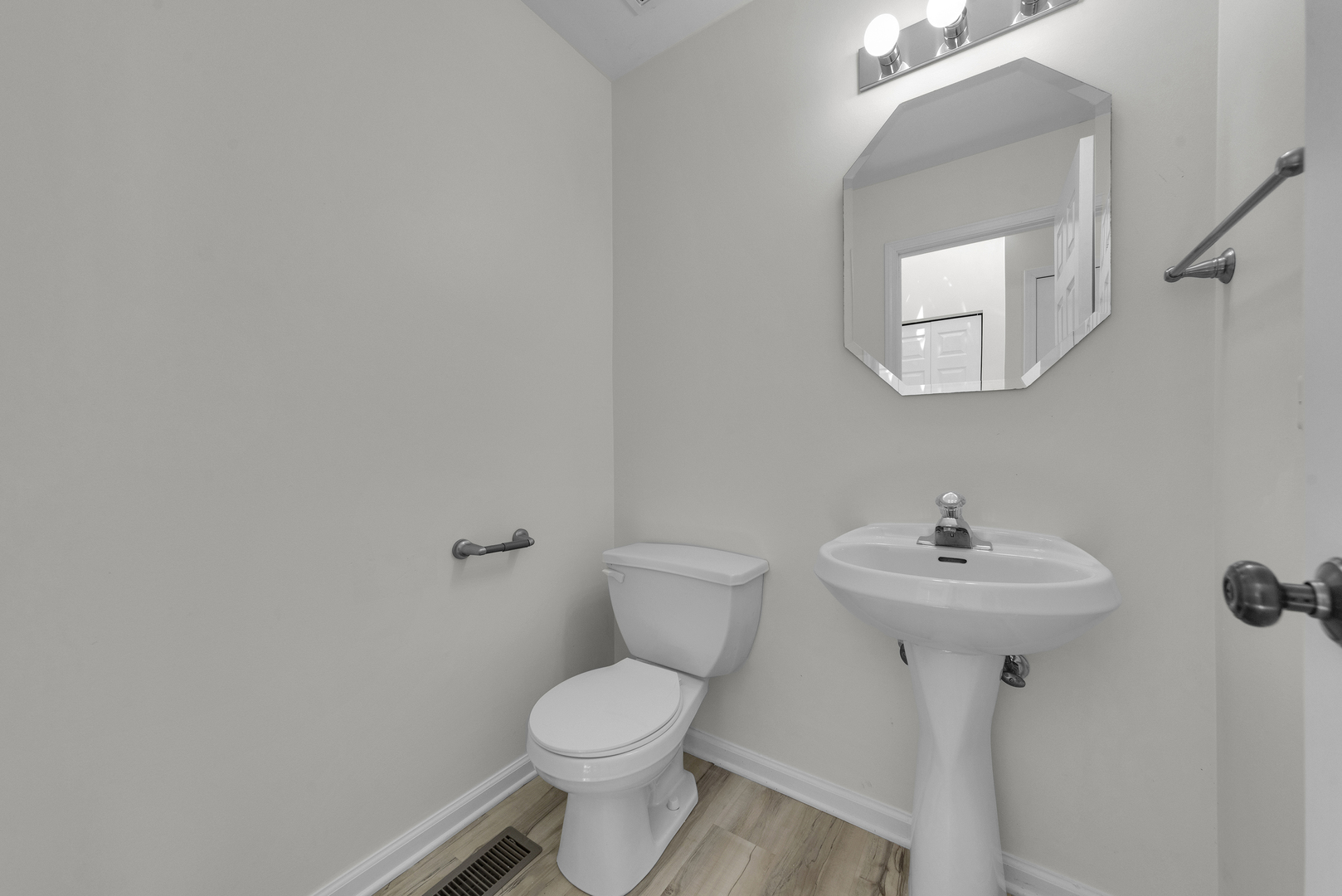 608 Chestnut Ridge Minooka, IL 60447 - Photo 9 of 16 a bathroom with a sink mirror and toilet