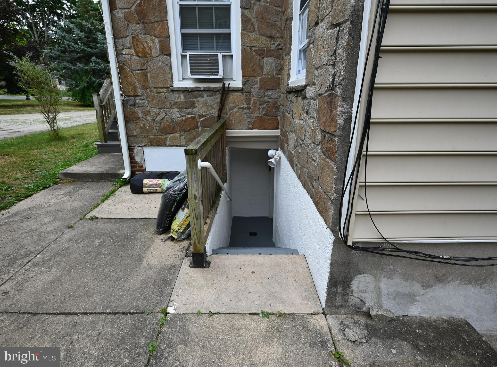 1001 Clements Bridge Road Barrington, NJ 08007 - Photo 45 of 58 Outside Steps in Back to Basement