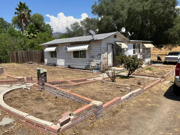 a view of a house with a patio