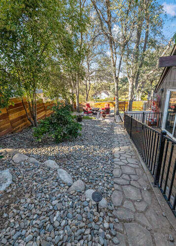 40861 Ferndale Drive Three Rivers, CA 93271 - Photo 42 of 49 a view of a pathway with a wrought fence