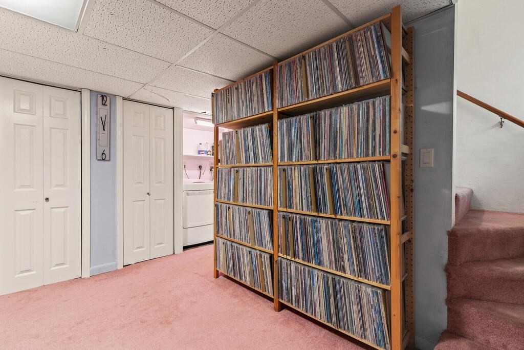 6 Pear Tree Drive Canton, MA 02021 - Photo 20 of 33 a view of a hallway with wooden staircase
