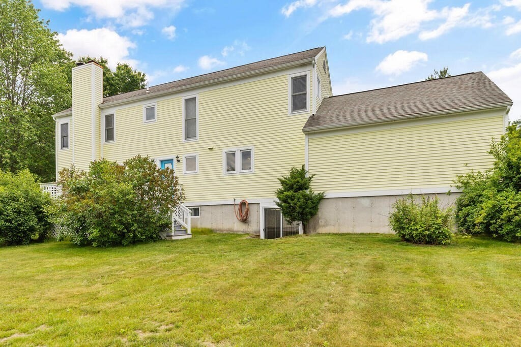 6 Pear Tree Drive Canton, MA 02021 - Photo 27 of 33 a front view of house with small garden