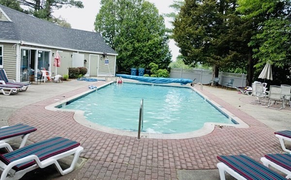 6 Pear Tree Drive Canton, MA 02021 - Photo 30 of 33 a view of a swimming pool with a patio