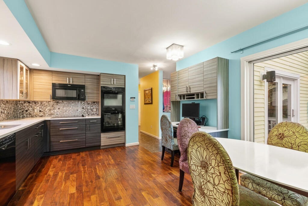 6 Pear Tree Drive Canton, MA 02021 - Photo 4 of 33 a bed room with a bed furniture and kitchen view