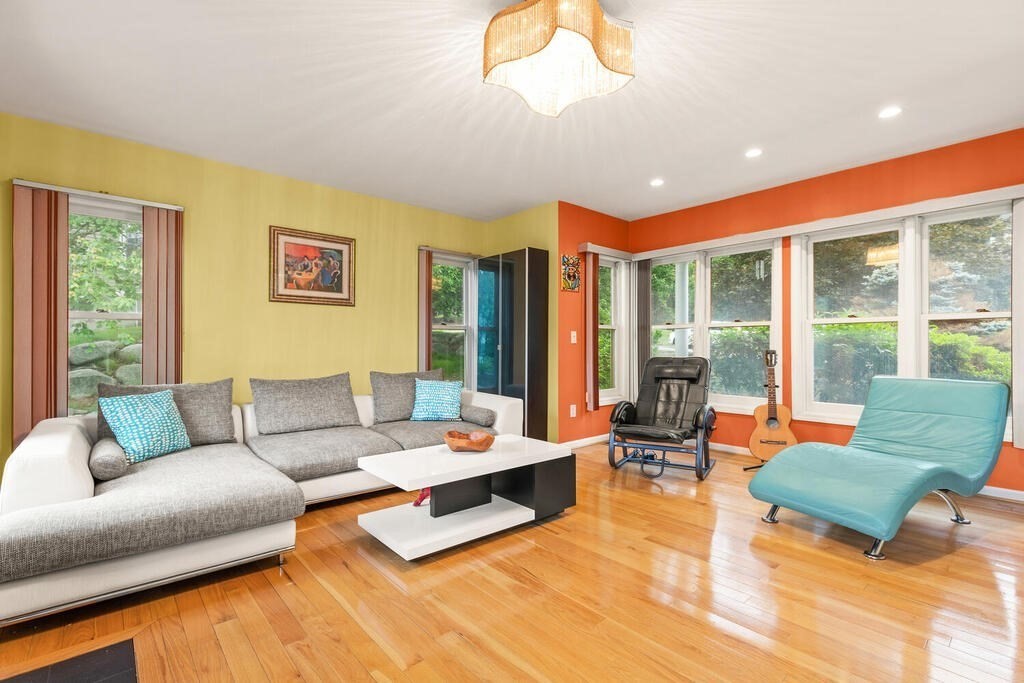6 Pear Tree Drive Canton, MA 02021 - Photo 7 of 33 a living room with furniture and a large window