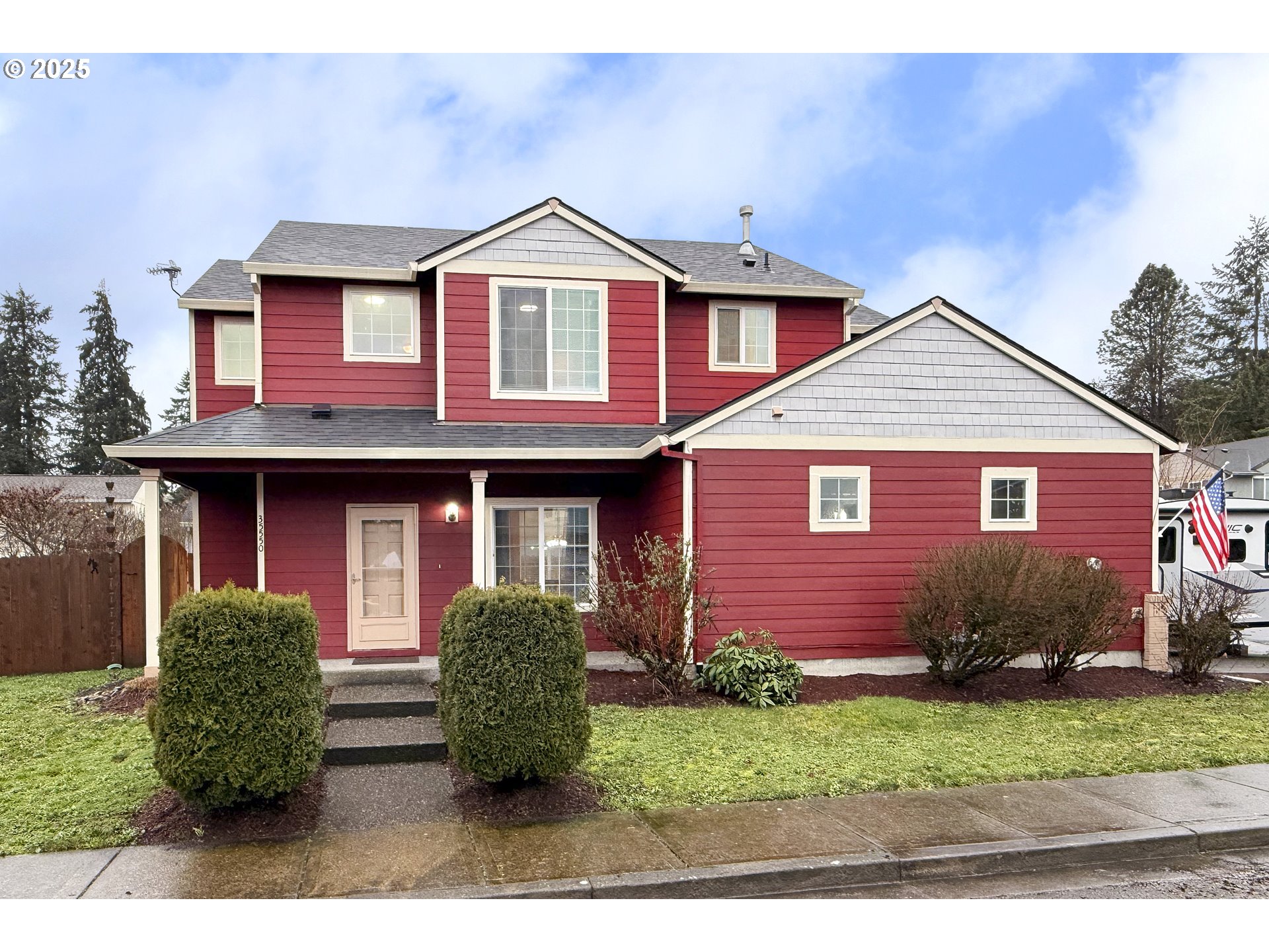 35550 Edie's Way St. Helens, OR 97051 - Photo 27 of 34 a front view of a house with a yard and garage