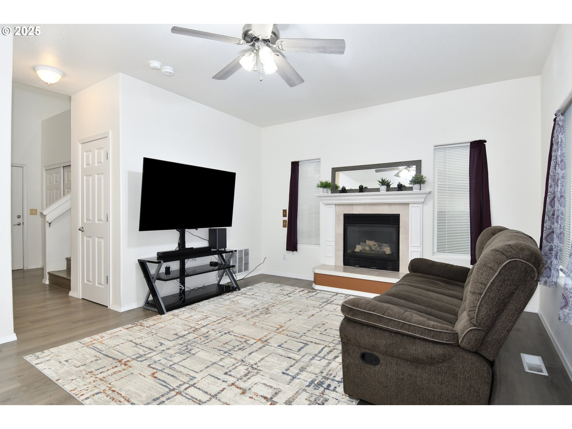 35550 Edie's Way St. Helens, OR 97051 - Photo 4 of 34 a living room with furniture a flat screen tv and a fireplace