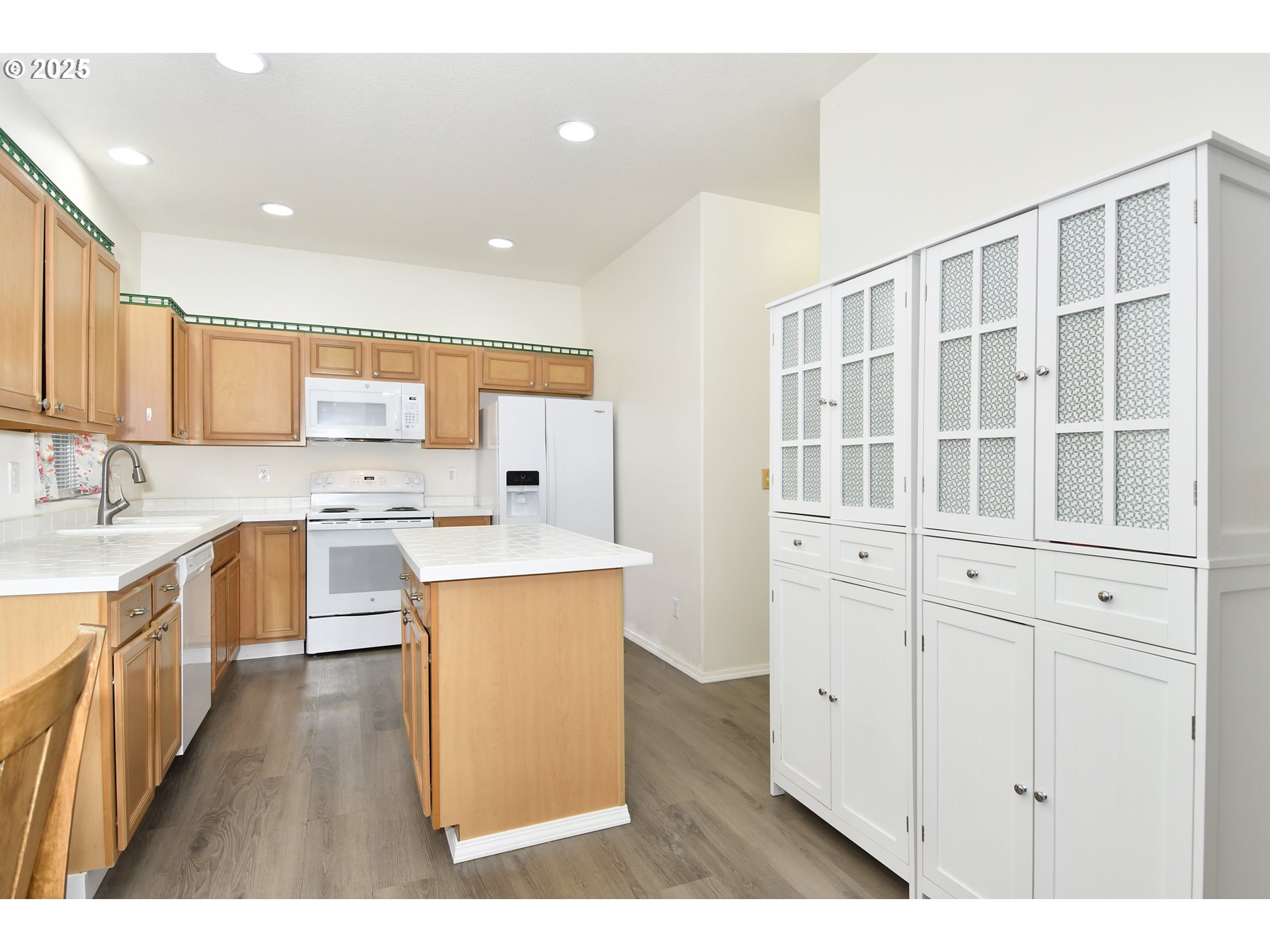 35550 Edie's Way St. Helens, OR 97051 - Photo 6 of 34 a kitchen with stainless steel appliances granite countertop a stove a sink and a refrigerator with wooden floor