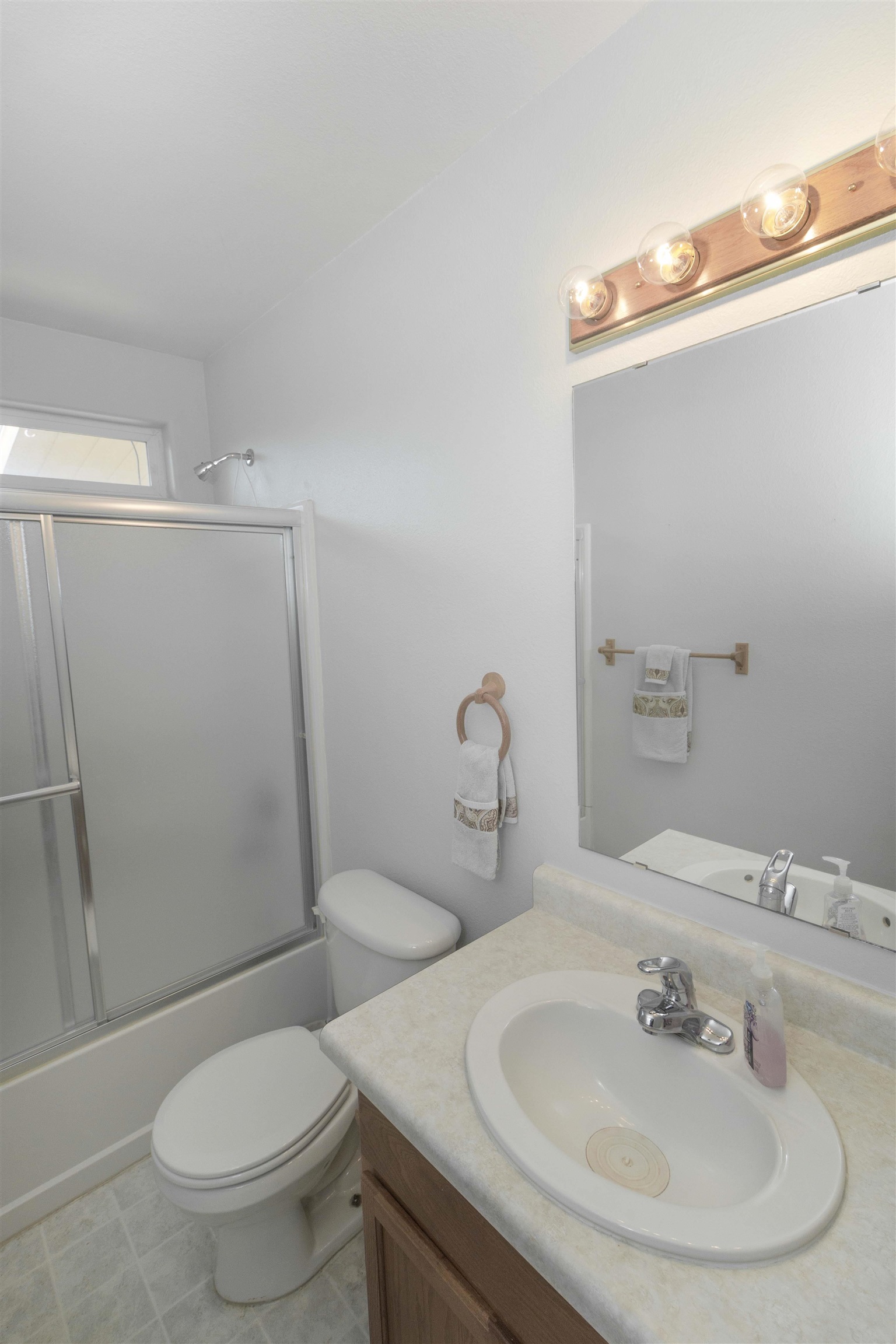 1386 Powell Street Fruita, CO 81521 - Photo 13 of 21 a bathroom with a sink toilet and shower