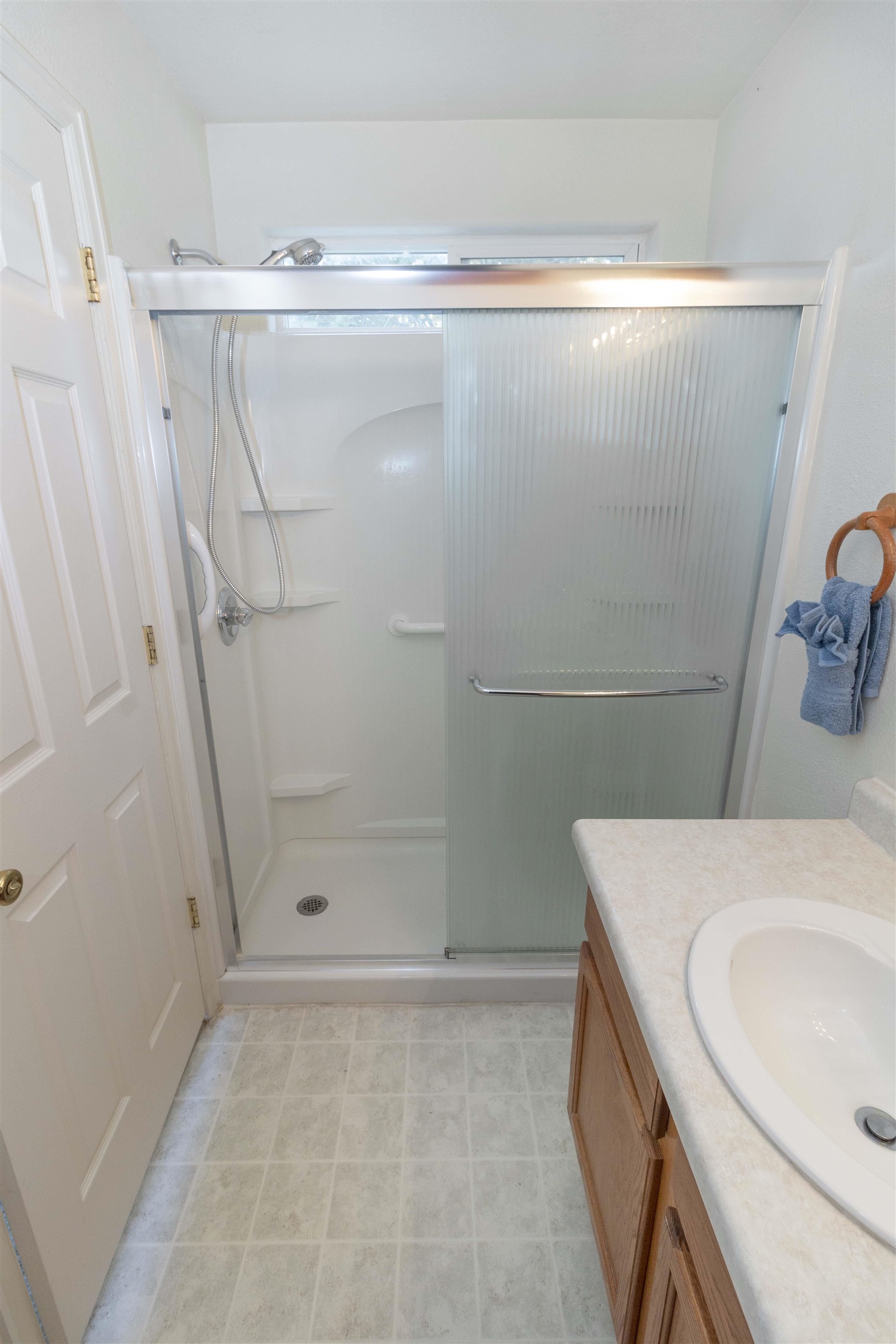1386 Powell Street Fruita, CO 81521 - Photo 16 of 21 a bathroom with a sink and a shower