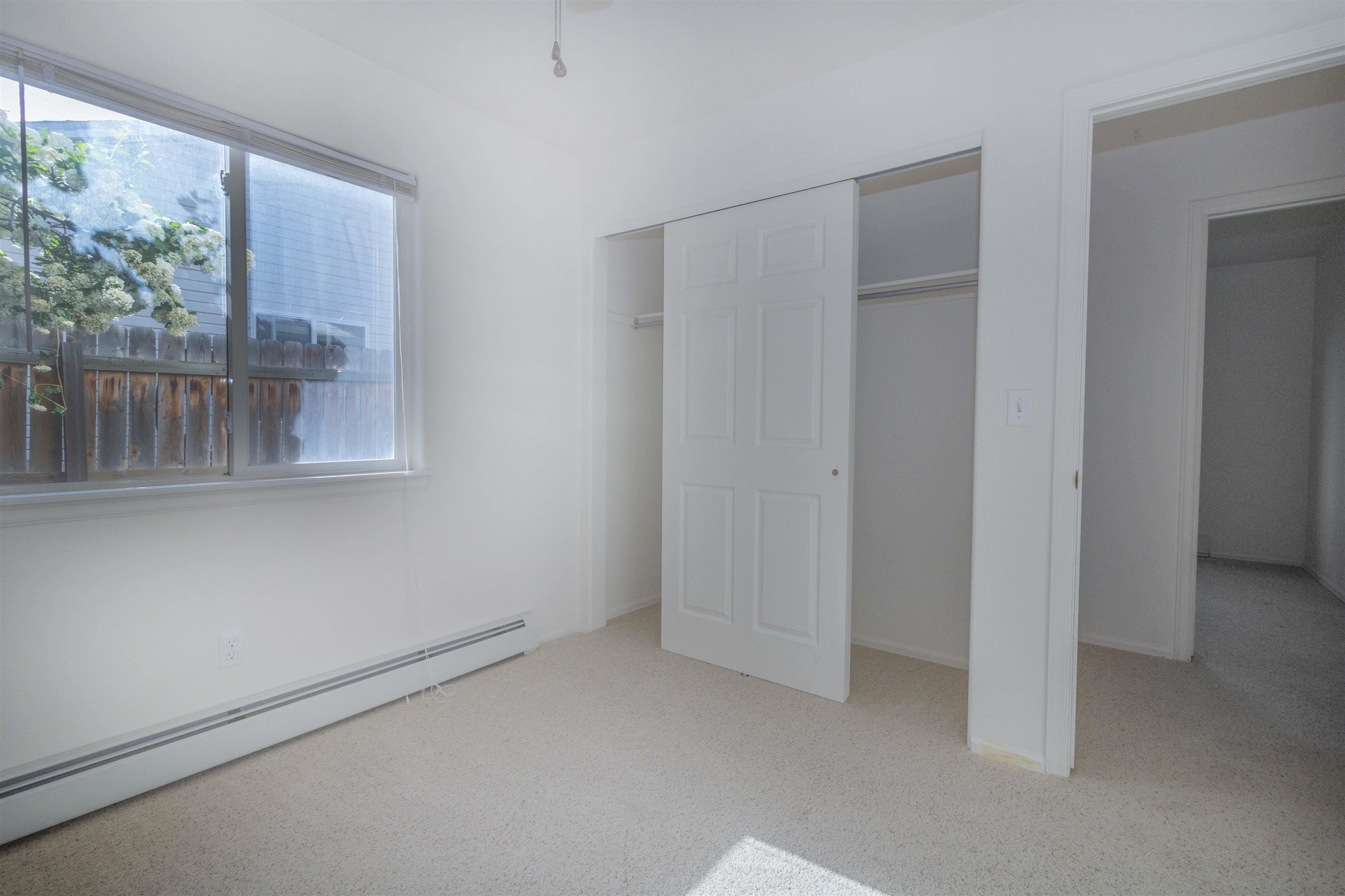 1386 Powell Street Fruita, CO 81521 - Photo 10 of 21 an empty room with windows