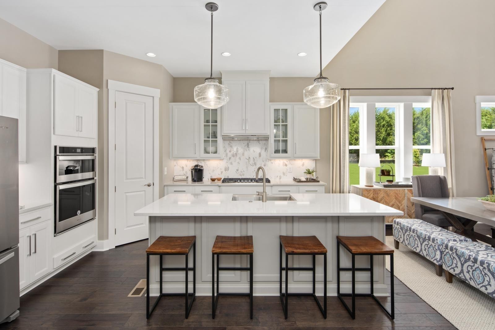 4203 Birmingham Road Lebanon, TN 37090 - Photo 29 of 55 a kitchen with stainless steel appliances a dining table chairs and wooden floor