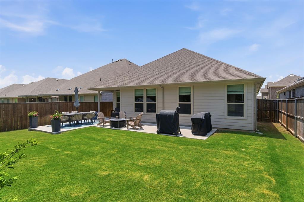 5621 Round Hl Road Denton, TX 76210 - Photo 26 of 27 a front view of house with yard and patio