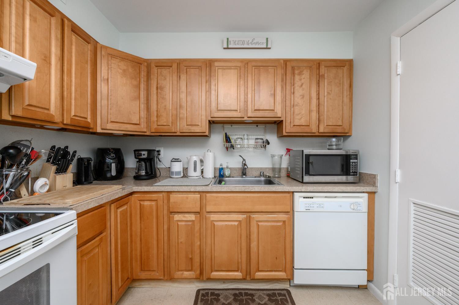 127 Chaucer Road Mount Laurel, NJ 08054 - Photo 11 of 43 a kitchen with stainless steel appliances granite countertop a sink a stove and cabinets