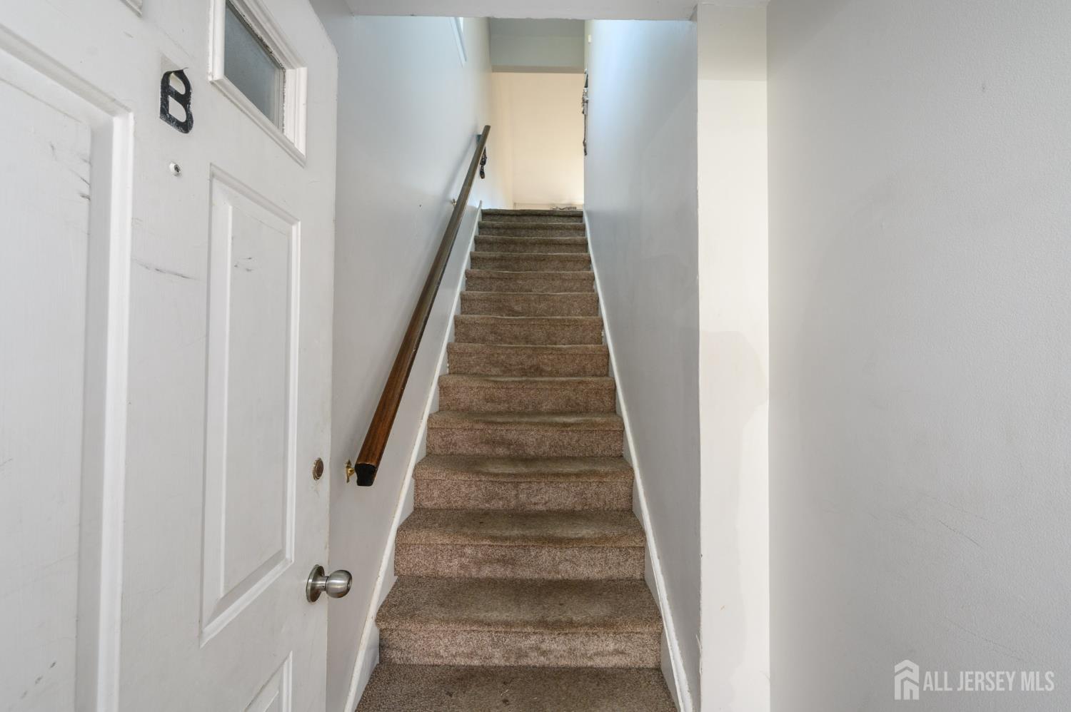 127 Chaucer Road Mount Laurel, NJ 08054 - Photo 19 of 43 a view of a hallway with wooden floor and entryway