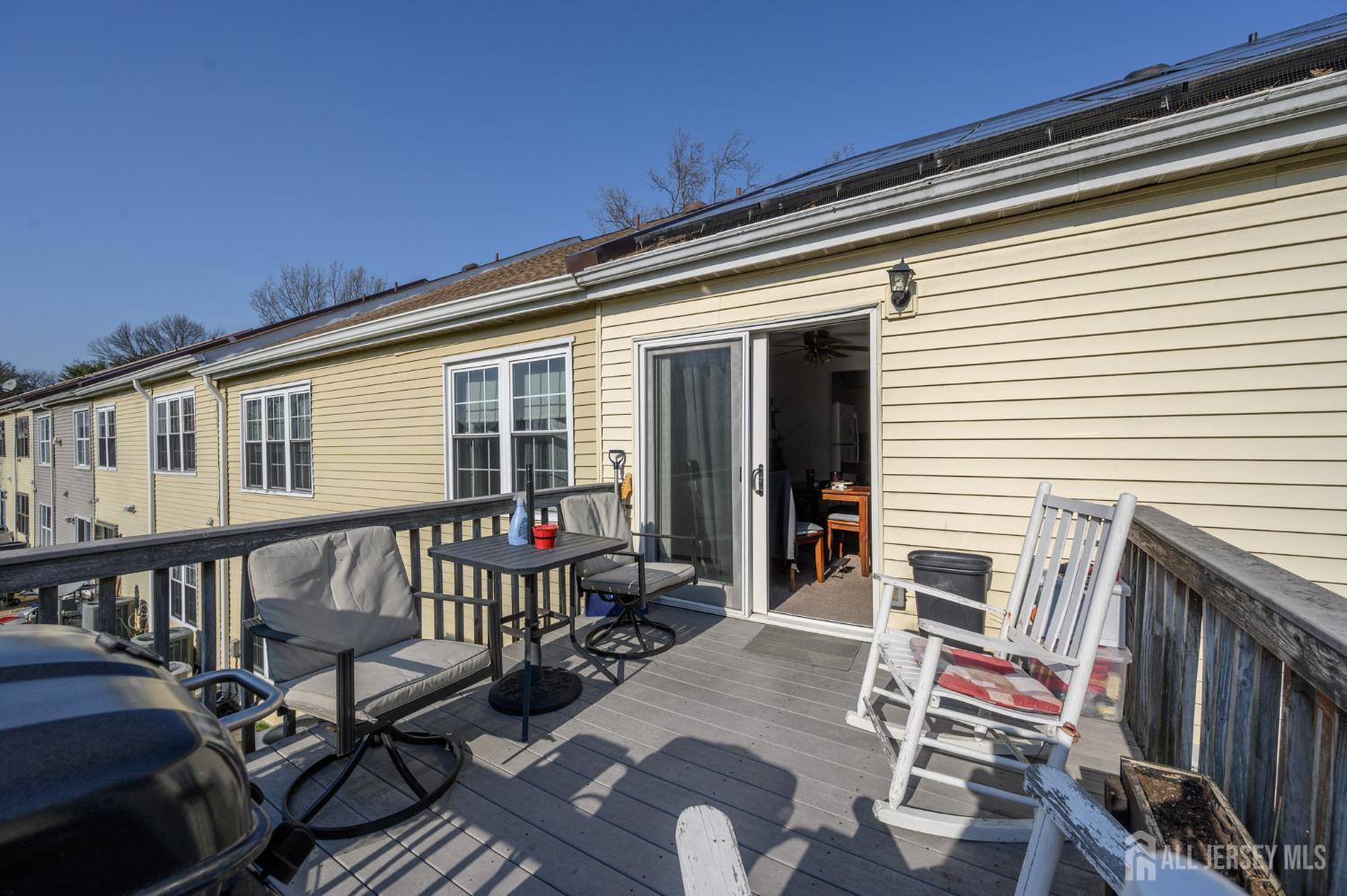 127 Chaucer Road Mount Laurel, NJ 08054 - Photo 25 of 43 a view of a chairs on the deck