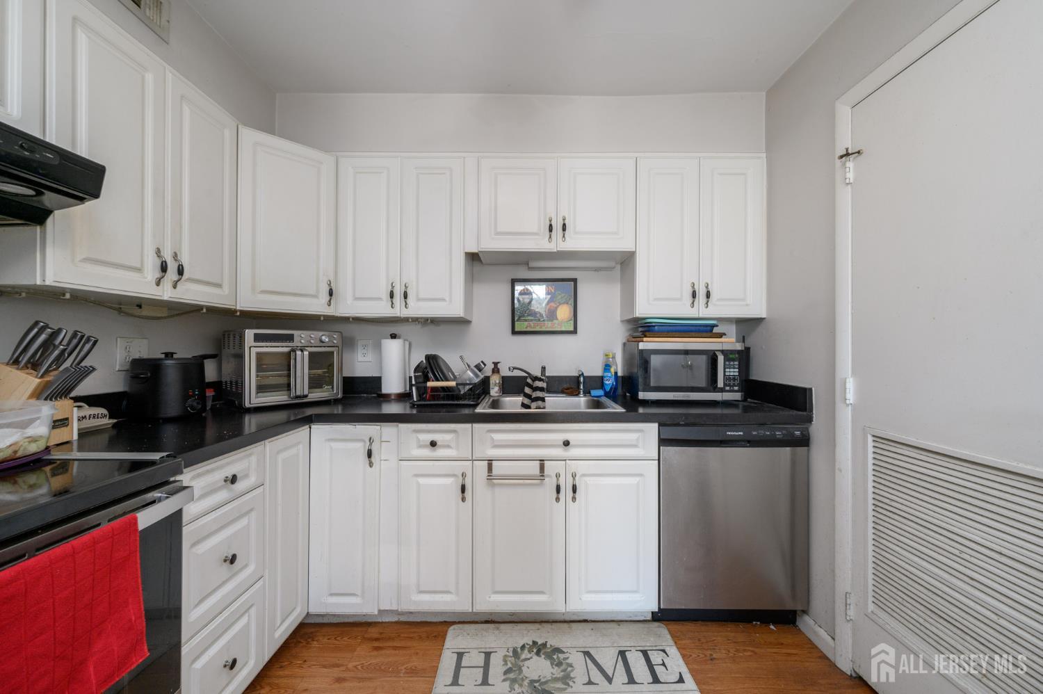 127 Chaucer Road Mount Laurel, NJ 08054 - Photo 29 of 43 a kitchen with stainless steel appliances granite countertop a sink a stove and cabinets