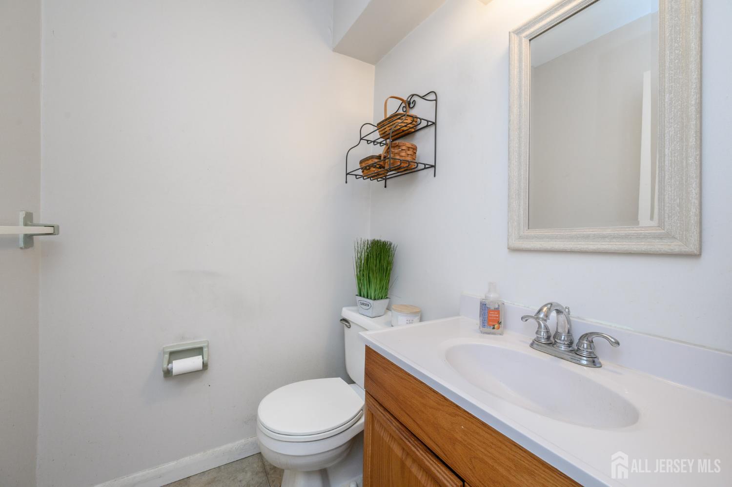 127 Chaucer Road Mount Laurel, NJ 08054 - Photo 31 of 43 a bathroom with a sink vanity and toilet