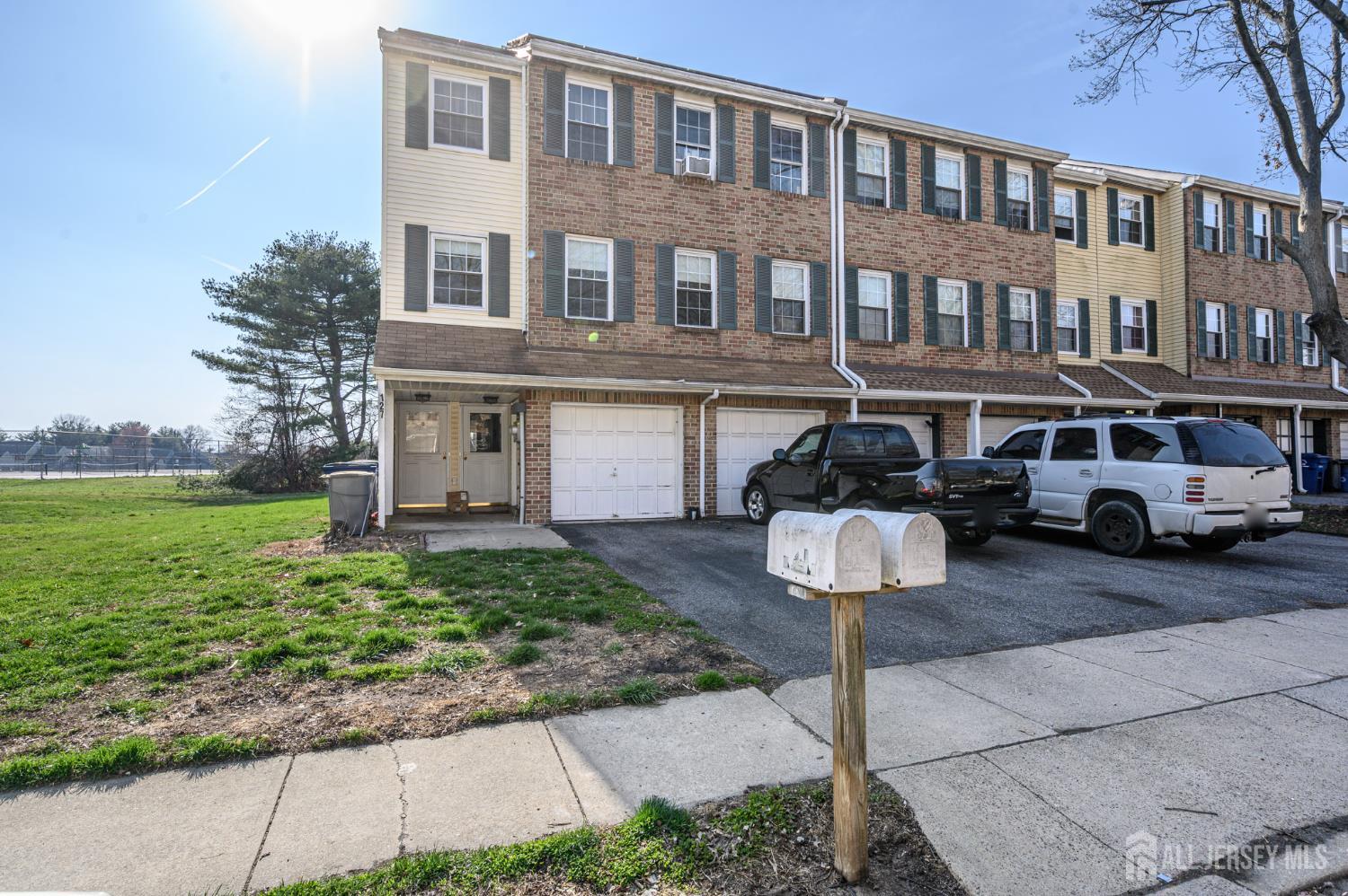 127 Chaucer Road Mount Laurel, NJ 08054 - Photo 43 of 43 a front view of a building with garden