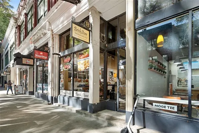 a view of a building with a door and windows