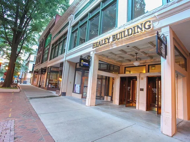 a view of a building with stores