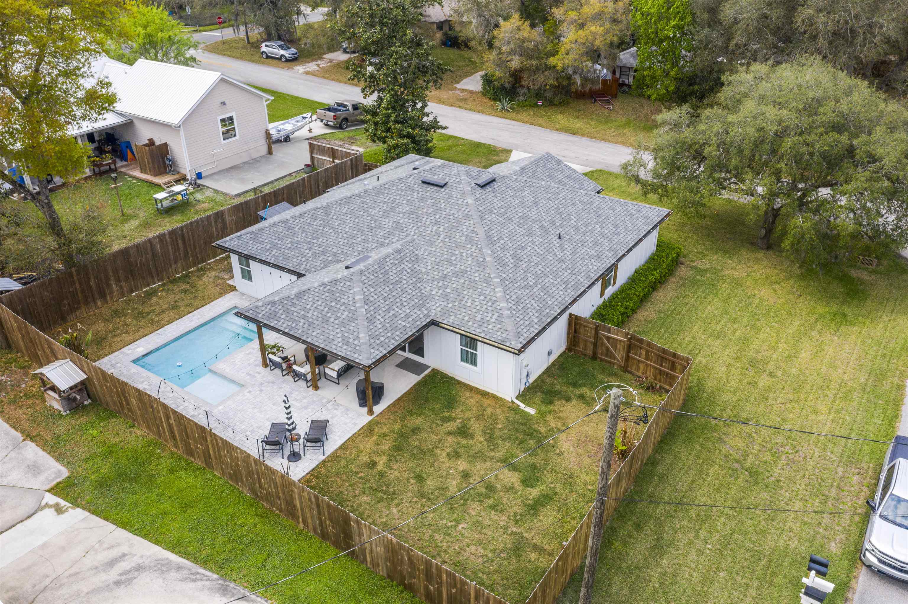 308 Tolomato Road St. Augustine, FL 32086 - Photo 36 of 39 an aerial view of a house with a swimming pool