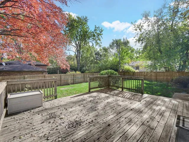 a view of a deck with a back yard