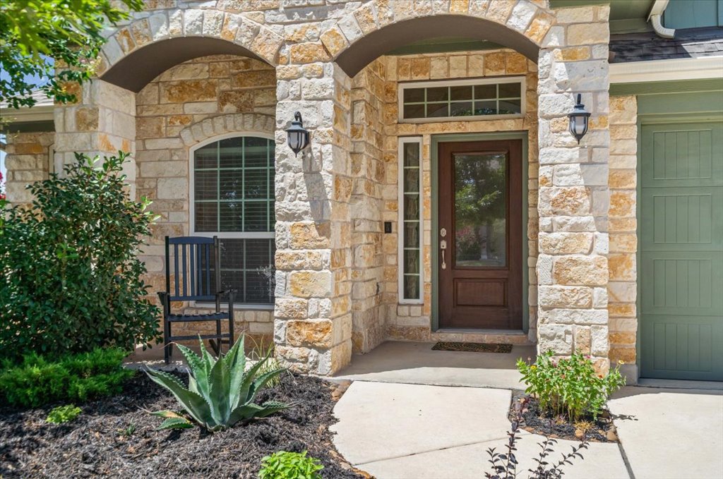132 Vino Rossi Road Georgetown, TX 78628 - Photo 2 of 35 Sitting Front Porch to invite guests