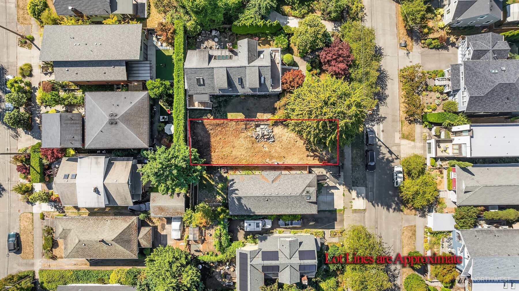 133 Northeast 60th Street Seattle, WA 98115 - Photo 5 of 16 an aerial view of multiple houses with a yard