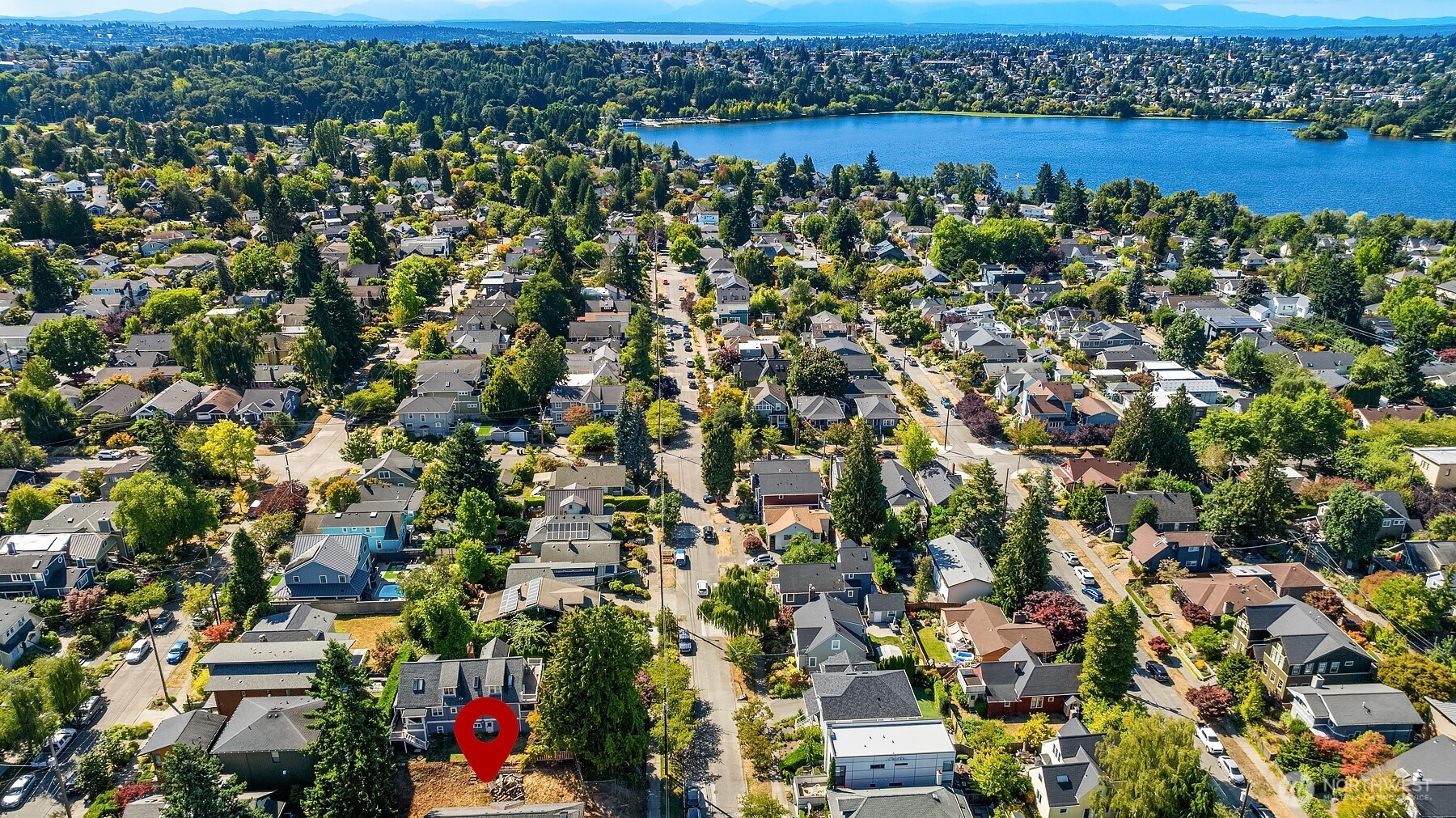 133 Northeast 60th Street Seattle, WA 98115 - Photo 6 of 16 an aerial view of a houses with a lake view