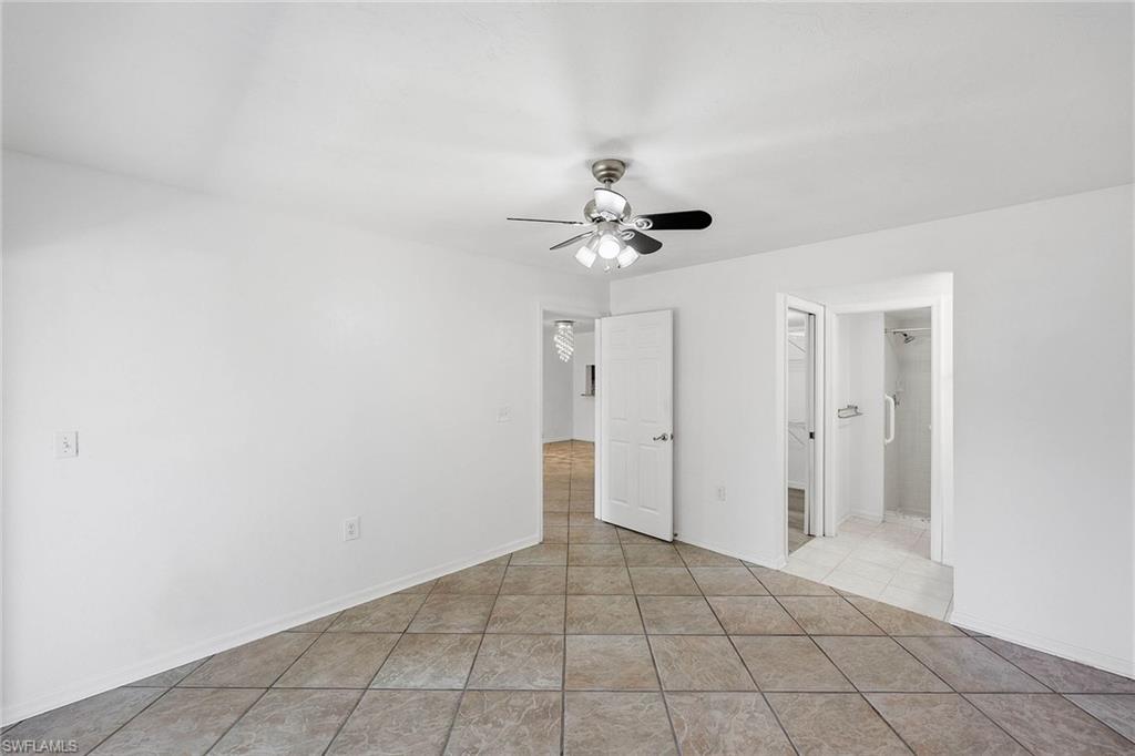 1231 Commonwealth Circle, Unit Q104 Naples, FL 34116 - Photo 21 of 33 a view of an empty room