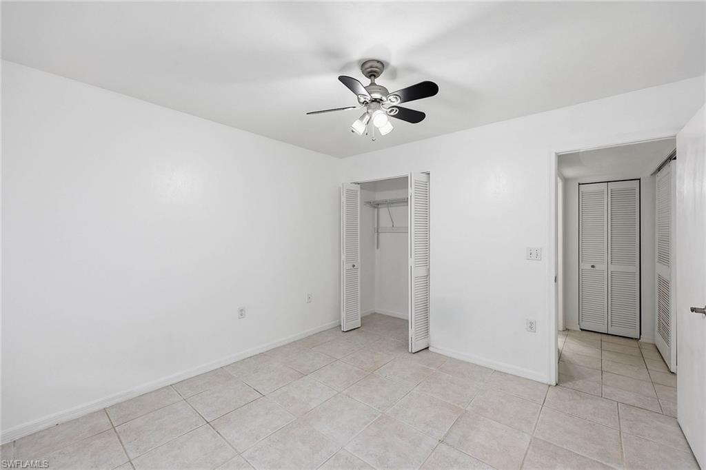 1231 Commonwealth Circle, Unit Q104 Naples, FL 34116 - Photo 25 of 33 a view of an empty room