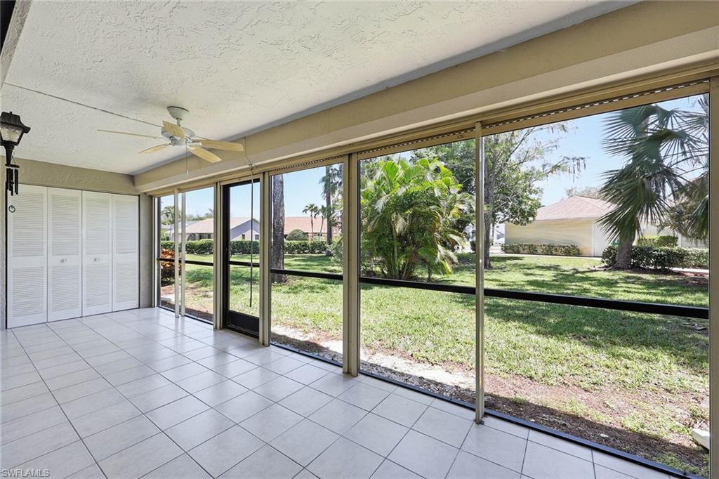 1231 Commonwealth Circle, Unit Q104 Naples, FL 34116 - Photo 27 of 33 a view of a room with window