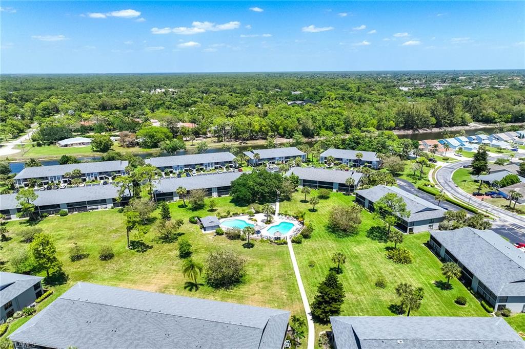 1231 Commonwealth Circle, Unit Q104 Naples, FL 34116 - Photo 29 of 33 a view of a city