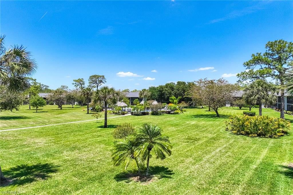 1231 Commonwealth Circle, Unit Q104 Naples, FL 34116 - Photo 30 of 33 a garden view