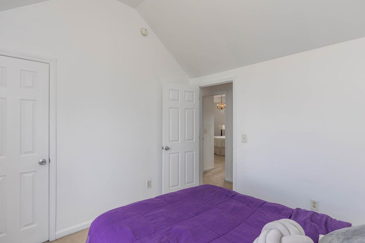 3409 Colossae Court Raleigh, NC 27610 - Photo 21 of 28 a bedroom with a bed and a closet
