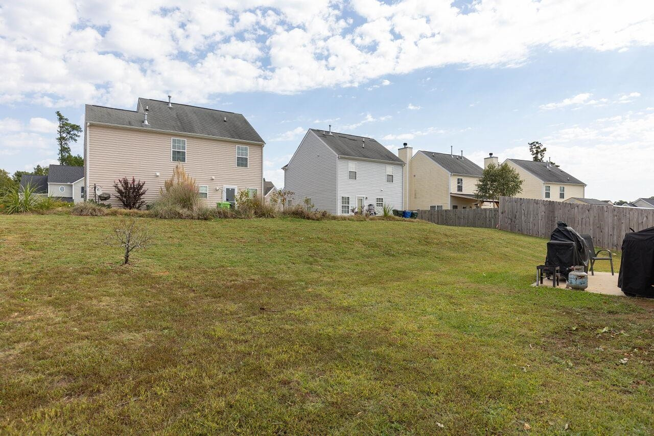 3409 Colossae Court Raleigh, NC 27610 - Photo 27 of 28 a view of a big room with table and chairs