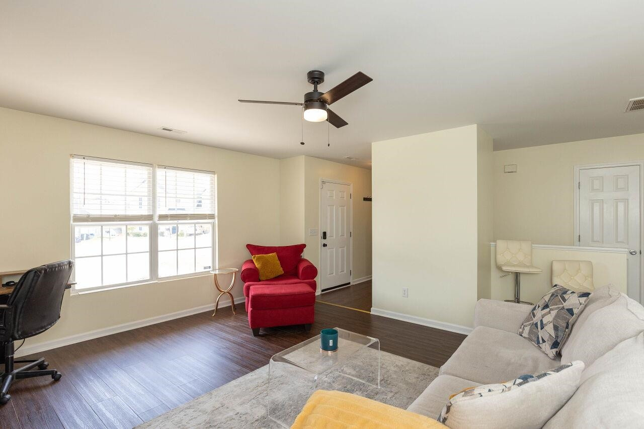 3409 Colossae Court Raleigh, NC 27610 - Photo 7 of 28 a bedroom with furniture and a window