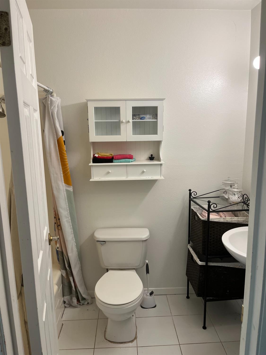 31397 Erie Road Coarsegold, CA 93614 - Photo 16 of 21 a bathroom with a toilet and a sink