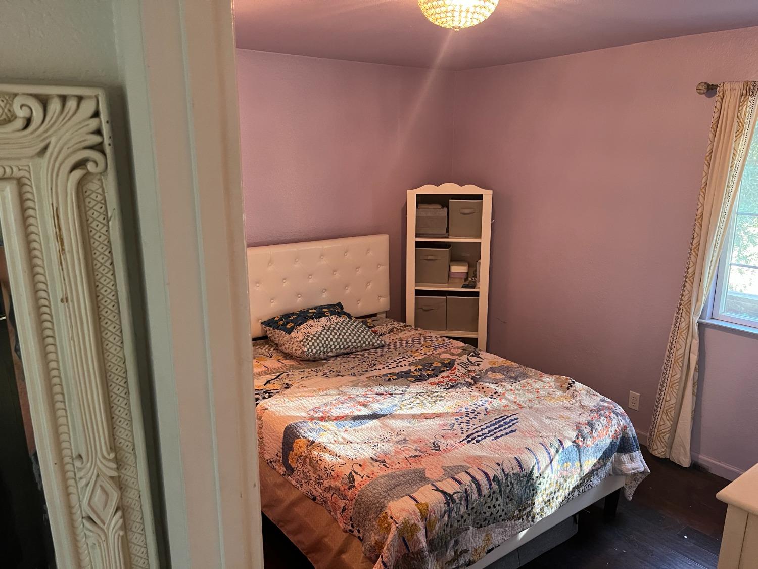 31397 Erie Road Coarsegold, CA 93614 - Photo 20 of 21 a bedroom with a bed and a window