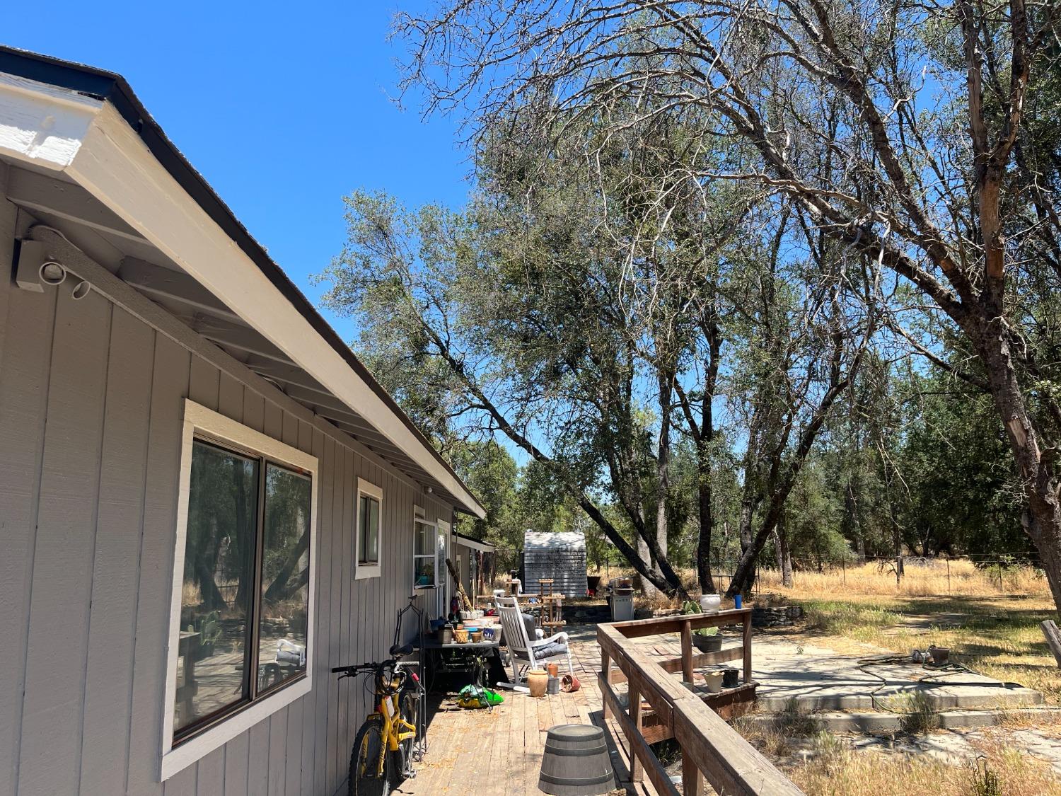 31397 Erie Road Coarsegold, CA 93614 - Photo 4 of 21 a view of a house with backyard and sitting area