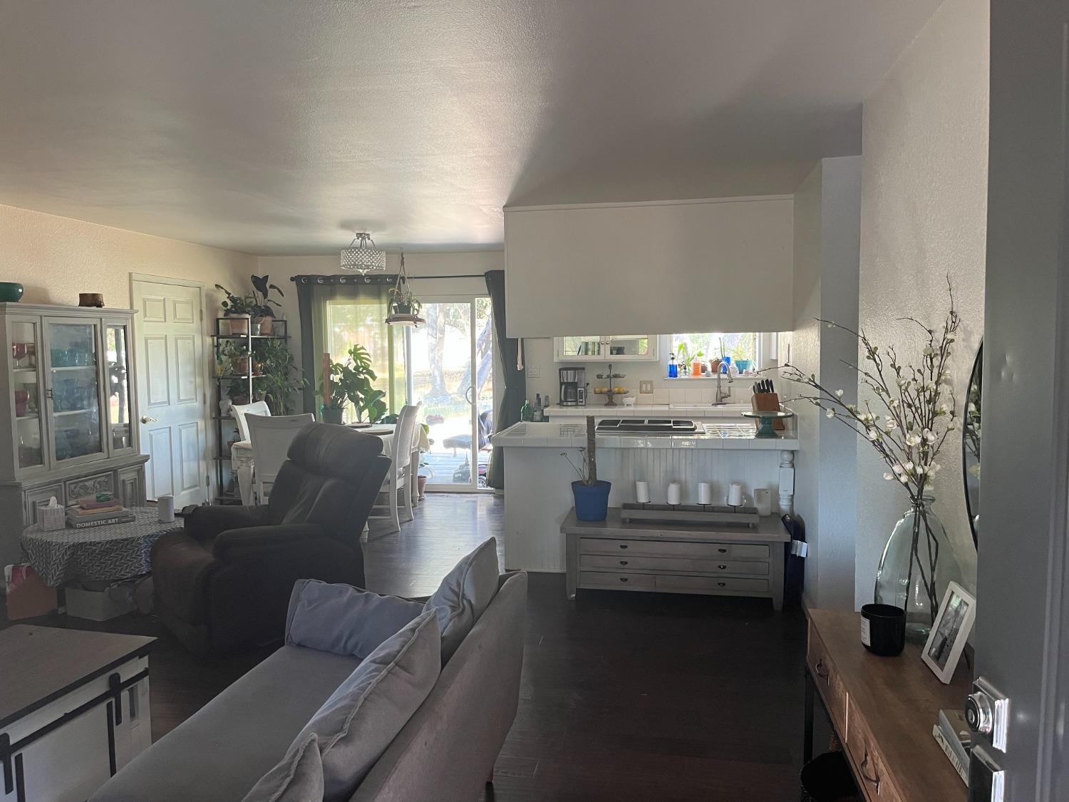 31397 Erie Road Coarsegold, CA 93614 - Photo 7 of 21 a living room with furniture and a fireplace
