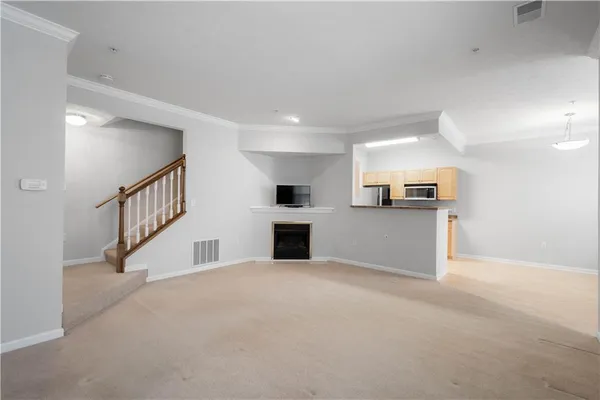 a view of a kitchen with a sink