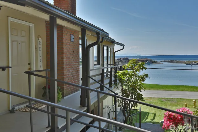 a view of balcony with wooden floor