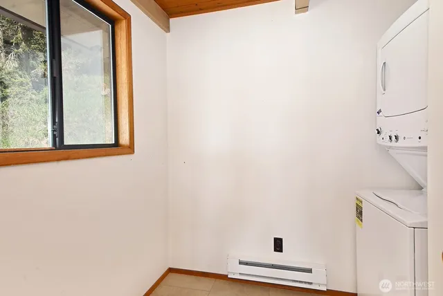 a view of a room with wooden walls