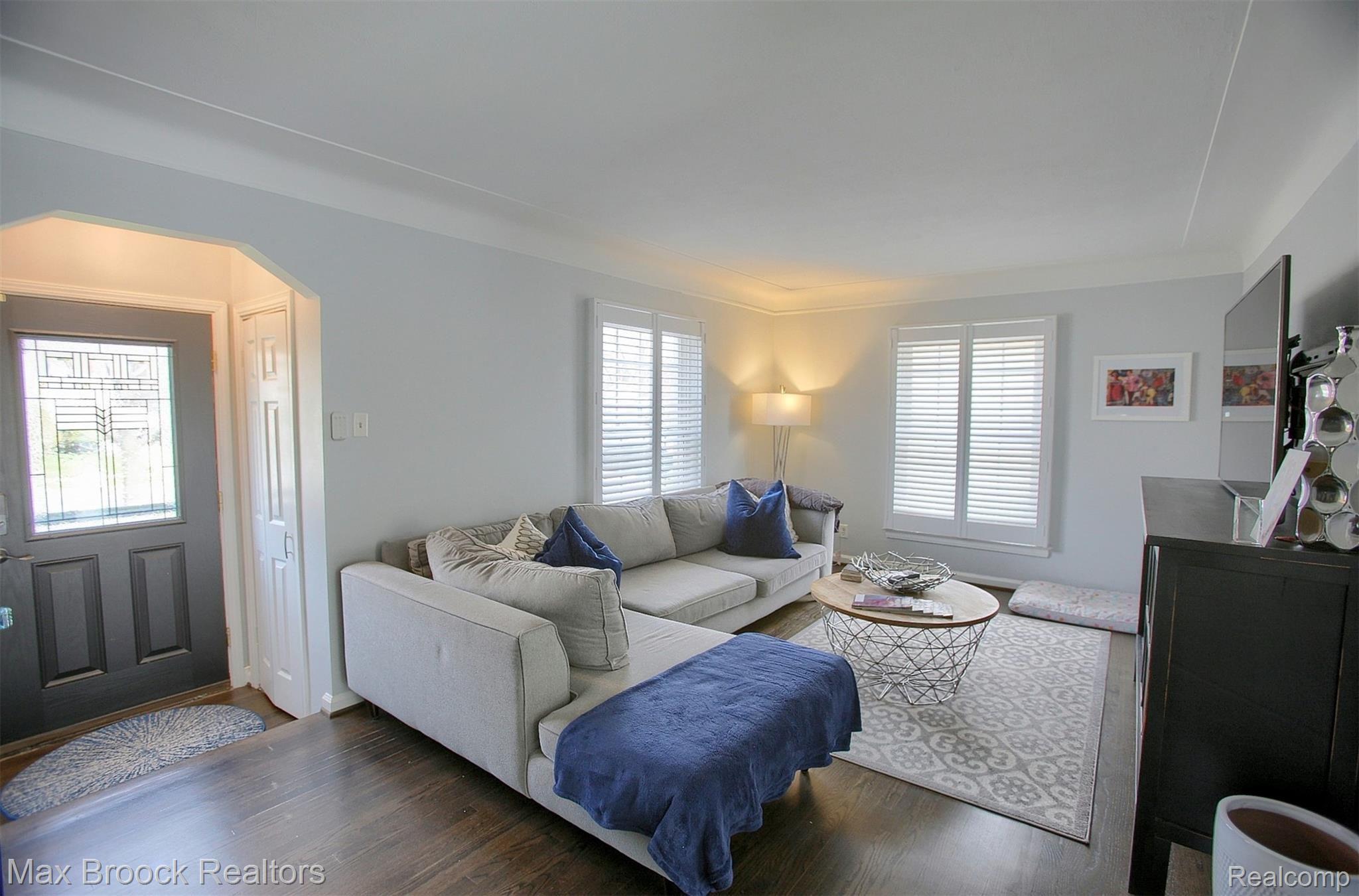 Enter Into Updated Dark Harwood Floors and Fresh, Light Paint